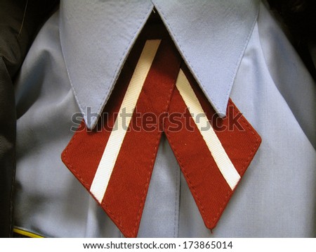 Latvian police woman uniform necktie close up