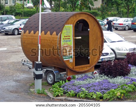 PALANGA, LITHUANIA - AUGUST 12, 2009: Mobile bath in car trailer is for rent on parking place.