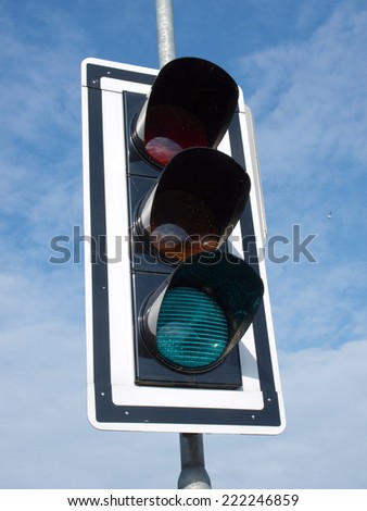Traffic control lights with green signal on
