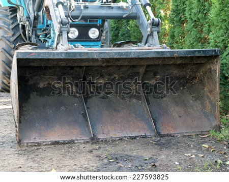 Tractor front loader shovel view close up