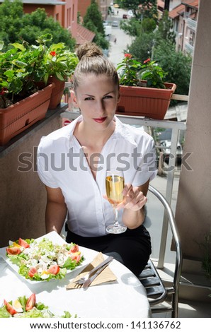 Businesswoman having a lunch break.