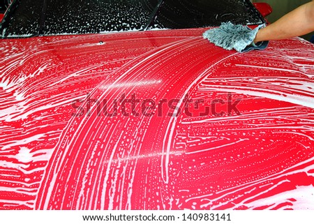 Sponge cleaning car wash