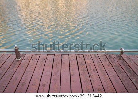 Wooden deck at the lake in Thailand