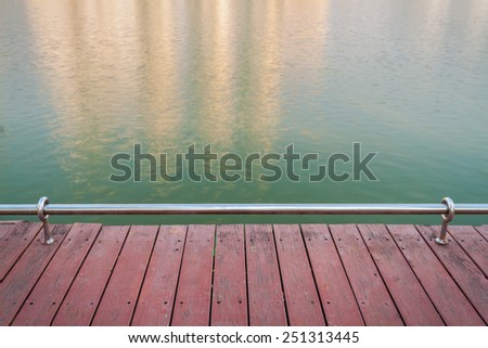 Wooden deck at the lake in Thailand