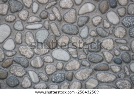Rock floor, background and pattern, smooth and round rocks smooth and round rocks