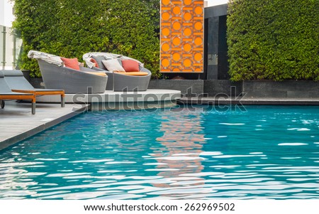 swimming pool with sofa