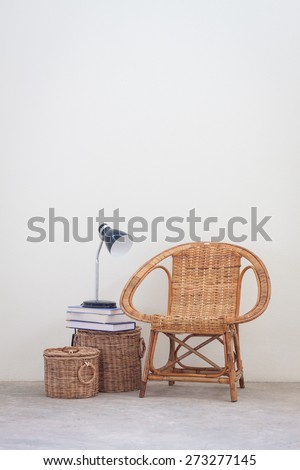 Rattan chair and furniture on concrete floor, interior decoration concept