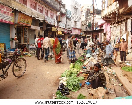 VARANASI, INDIA - NOVEMBER 1: People sell groceries on street market on November 1, 2012 at Varanasi, Uttar Pradesh, Central India.