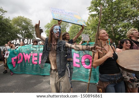 BALCOMBE, UNITED KINGDOM - AUGUST 18: People gather together for an anti-fracking protest march against the energy company Cuadrilla on August 18, 2013 in Balcombe, UK.