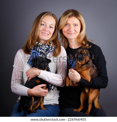 Petit Brabancon dog and woman