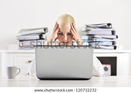 blonde woman having worries at work