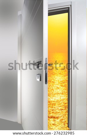white door open to the sunset