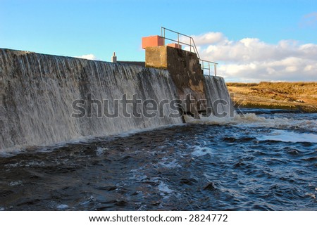 The water in Loch More, Caithness, is overflowing into the river Thurso, a great Scottish Salmon river.