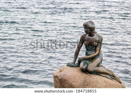 The Little Mermaid is a bronze statue by Edvard Eriksen, depicting a mermaid. The sculpture is displayed on a rock by the waterside at the Langelinie promenade in Copenhagen, Denmark
