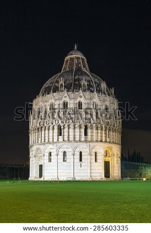 Evening. Pisa Baptistry stand on Piazza dei Miracoli in Pisa.The round Romanesque building was begun in the mid 12th century. It is the largest baptistery in Italy