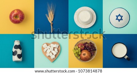 Jewish holiday Shavuot concept with milk and dairy products. View from above. Flat lay
