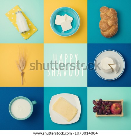 Jewish holiday Shavuot concept with milk and dairy products. View from above. Flat lay