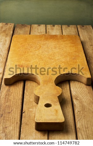 Vintage cutting board o wooden deck tabletop