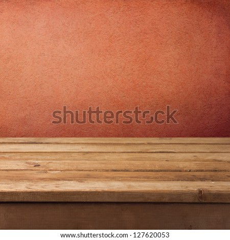 Background with empty wooden deck table and grunge rough wall