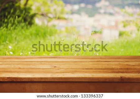 Empty Wooden Table Over Bokeh Natural Background