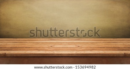 Background With Empty Wooden Deck Table Over Grunge Wallpaper