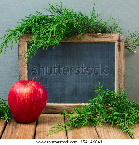 Christmas background with chalkboard and apple
