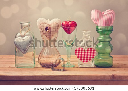 Valentine's day background with heart shapes in different vases Valentine's day background with heart shapes in different vases