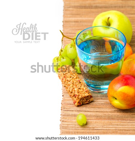 Diet concept. Water, healthy snack bar and fruits over white background