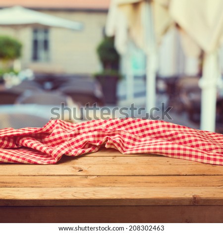 Table with cloth over restaurant blur background