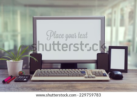 Office desk mock up with blank screen