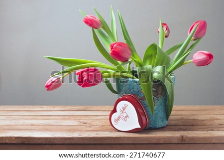 Tulip flowers and gift box for Mother\'s Day celebration