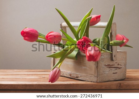 Tulip flowers in wooden box for Mother\'s Day celebration