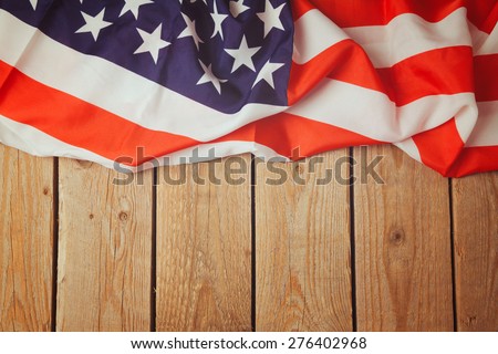 United States of America flag on wooden background. 4th of july celebration