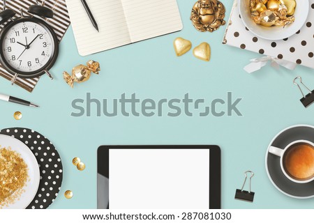 Website header design with digital tablet and feminine glamour objects over blue background