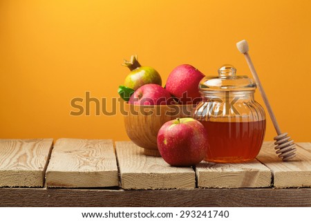 Jewish holiday Rosh Hashana (new year) celebration with honey jar and apples