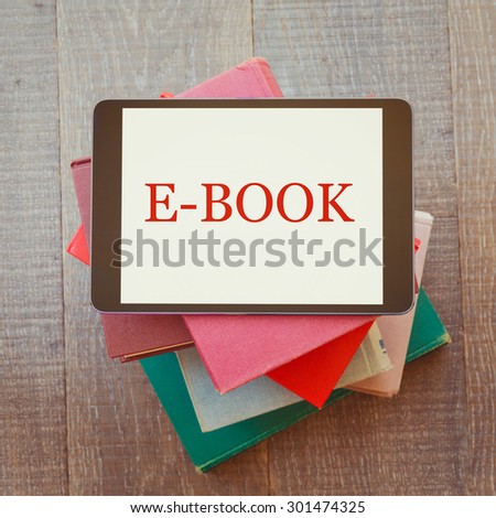 E-book library concept with digital tablet and books