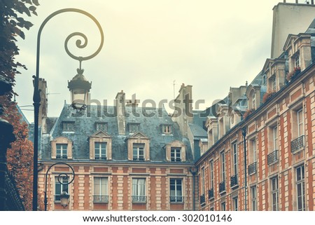 Paris, France. Place des Vosges. Retro filter effect