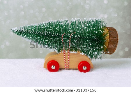 Christmas holiday concept with pine tree on toy car