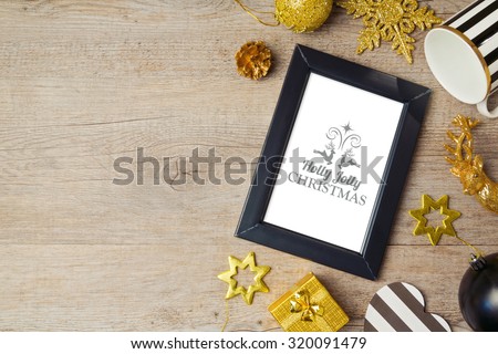 Christmas background with poster mock up template and decorations. View from above
