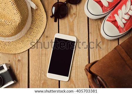 Smartphone mock up template with hipster fashion objects. View from above. Flat lay