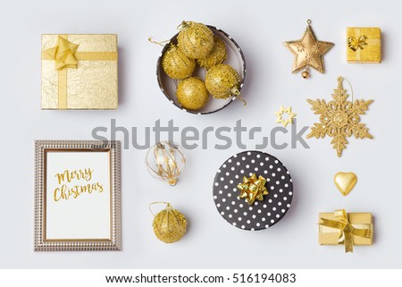 Christmas decorations and objects in black and gold for mock up template design.View from above. Flat lay