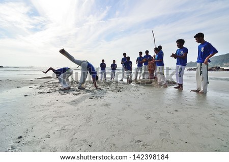  - stock-photo-kuantan-pahang-jan-real-capoeira-performance-at-teluk-cempedak-beach-kuantan-pahang-on-jan-142398184