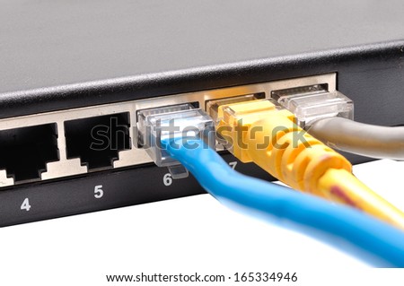Close up of network cables connected to switch