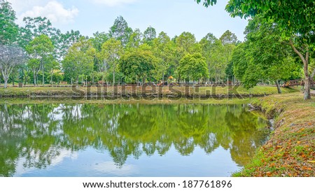 Beautiful lake with green tree. High Dynamic Range (HDR) process with 3 exposures