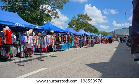 PAHANG, MALAYSIA - MAY 25, 2014 : Clothing store at street market every sunday at UTC Pahang, Malaysia on May 25, 2014