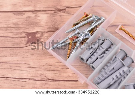 Screws and plastic anchor (wall plugs)