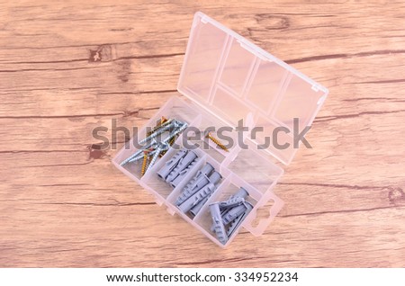Screws and plastic anchor (wall plugs)
