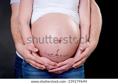 Drawing on the abdomen of a pregnant
