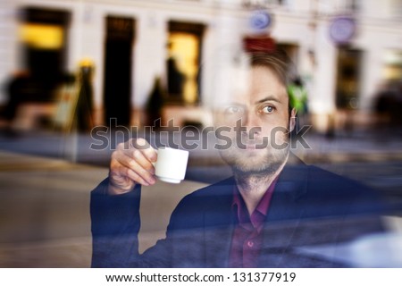 Forty Years Old Businessman Drinking Espresso Coffee In The City Cafe During Lunch Time