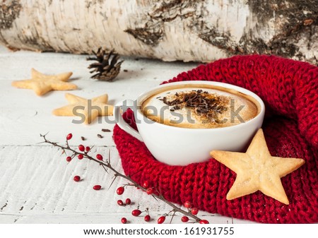 Winter Cappuccino Coffee In A White Cup With Star Shaped Christmas Cookies And Warm Scarf - Red And White Rural Still Life